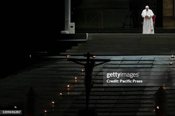 Pope Francis attends the Via Crucis celebrated for the first time at the empty St. Peter's Square during the Coronavirus emergency in Vatican City.