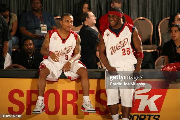 February 16: Hip-hop artist Bow Wow and NFL player Reggie Bush of Team West shares a laugh during the McDonald's NBA All-Star Celebrity Game...