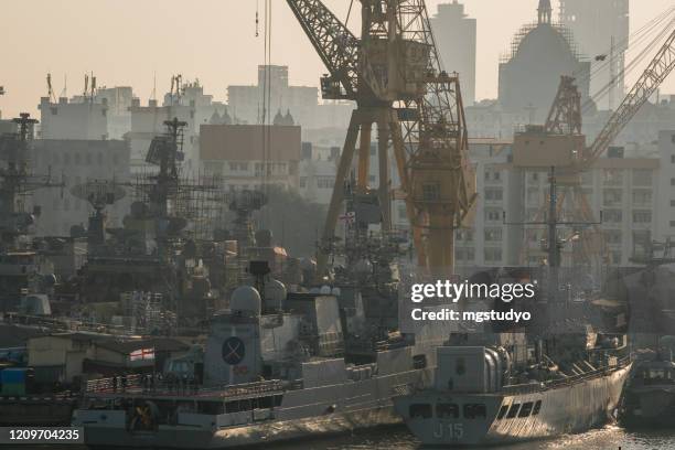 indian warship,anchored in mumbai hafen. - nautische ausrüstung stock-fotos und bilder