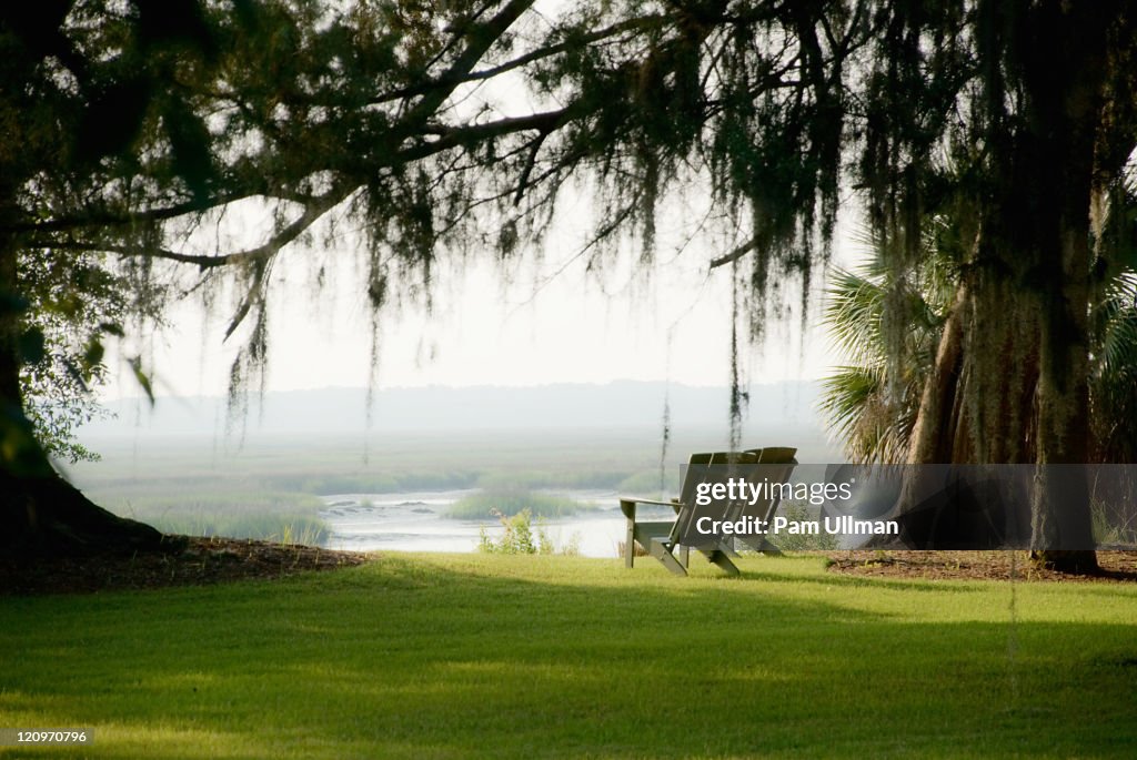 Adirondack chairs at sunrise