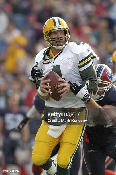 Green Bay Packers quarterback Brett Favre is sacked by Buffalo Bills defensive end Aaron Schobel at Ralph Wilson Stadium in Orchard Park, New York,...