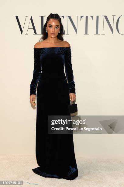 Amina Muaddi attends the Valentino show as part of the Paris Fashion Week Womenswear Fall/Winter 2020/2021 on March 01, 2020 in Paris, France.