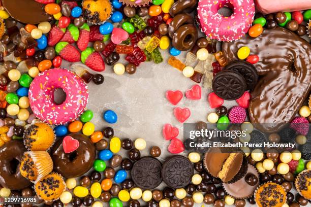 still life of sweets and goodies - saturated fat stock pictures, royalty-free photos & images