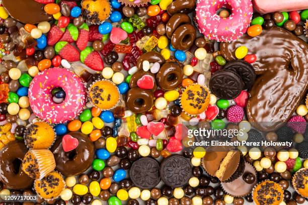 still life of sweets and goodies - bon bon foto e immagini stock
