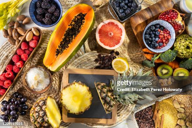 still life of natural fruits - tropical fruit stock pictures, royalty-free photos & images