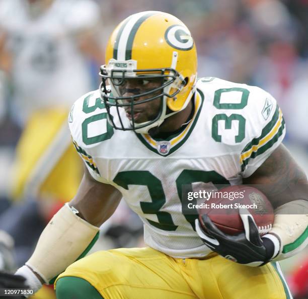 Green Bay Packers running back Ahman Green runs upfield during the game against the Buffalo Bills at Ralph Wilson Stadium in Orchard Park, New York....