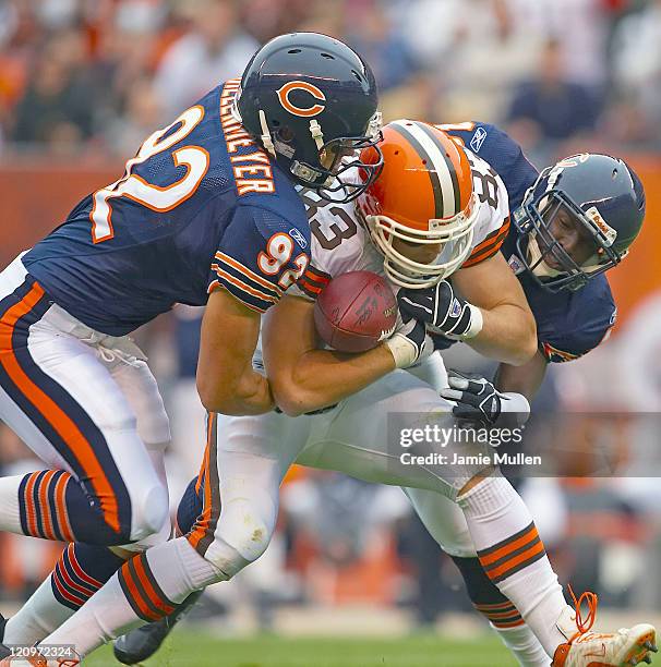 Cleveland Browns Tight End, Aaron Shea, is tackled by Chicago's Hunter Hillenmeyer during their game on Sunday October 9, 2005 at Cleveland Browns...