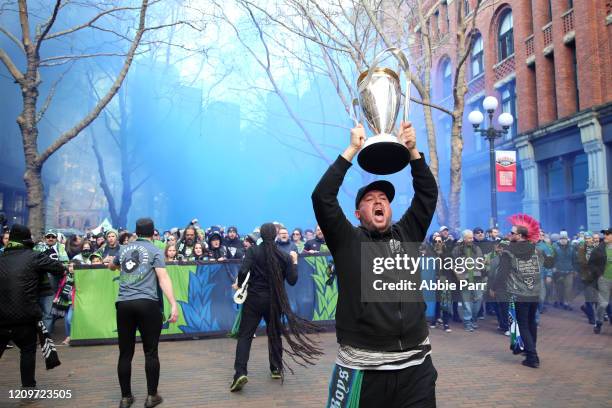 Seattle Sounders fans attend their traditional game-day March to the Match prior to their season opener against the Chicago Fire at CenturyLink Field...