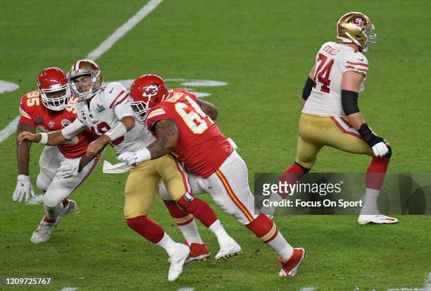 Mike Pennel of the Kansas City Chiefs puts the pressure on quarterback Jimmy Garoppolo of the San Francisco 49ers in Super Bowl LIV at Hard Rock...