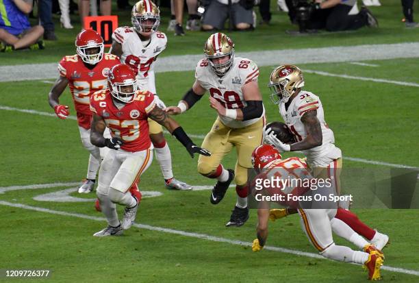 Raheem Mostert of the San Francisco 49ers carries the ball against the Kansas City Chiefs in Super Bowl LIV at Hard Rock Stadium on February 02, 2020...