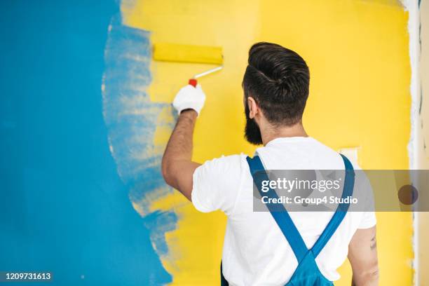 home renovation and wall painting - bright colour wall stock pictures, royalty-free photos & images