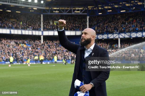 Former Everton Goalkeeper Tim Howard greets the fans during the Premier League match between Everton FC and Manchester United at Goodison Park on...