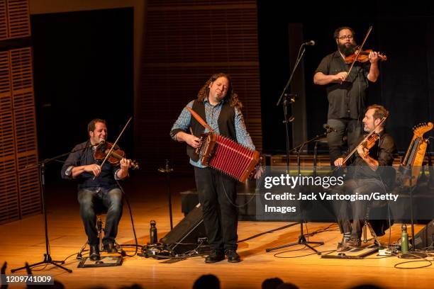 Members of the Quebecois Traditional folk groups Le Vent du Nord and De Temps Antan perform onstage at Carnegie Hall's Zankel Hall, New York, New...