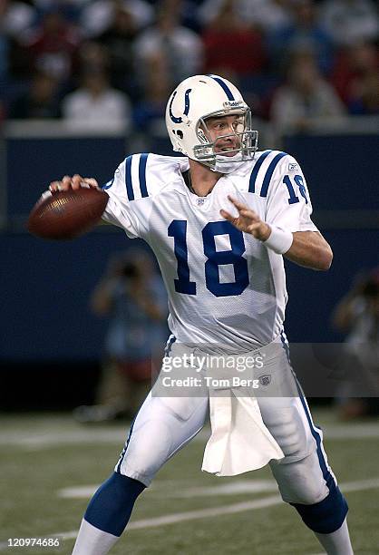 Indianapolis Colts quarterback Peyton Manning scrambling out of the pocket looking for a open receiver down field during the Indianapolis Colts vs...