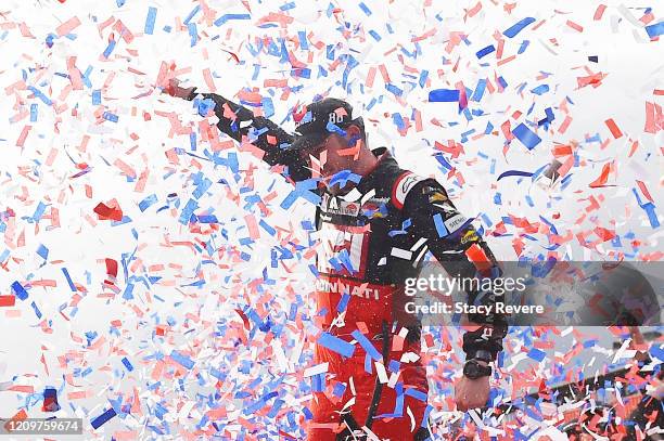 Alex Bowman, driver of the Cincinnati Chevrolet, celebrates in Victory Lane after winning the NASCAR Cup Series Auto Club 400 at Auto Club Speedway...