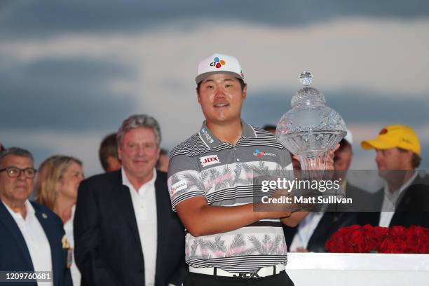 Sungjae Im of South Korea poses with the trophy after winning the Honda Classic at PGA National Resort and Spa Champion course on March 01, 2020 in...
