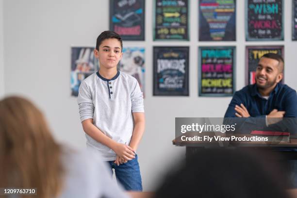 male student presenting in class - boy giving speech stock pictures, royalty-free photos & images