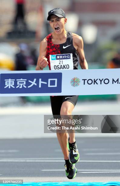 Suguru Osako of Japan celebrates as he finish fourth and top among Japanese during the Tokyo Marathon on March 1, 2020 in Tokyo, Japan.
