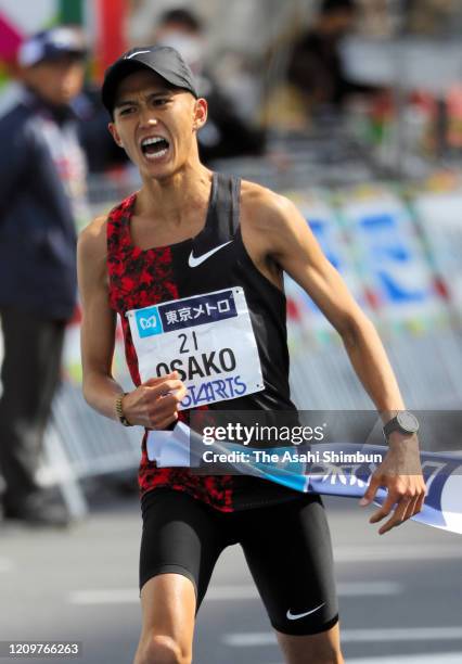 Suguru Osako of Japan celebrates as he finish fourth and top among Japanese during the Tokyo Marathon on March 1, 2020 in Tokyo, Japan.