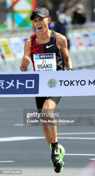 Suguru Osako of Japan celebrates as he finish fourth and top among Japanese during the Tokyo Marathon on March 1, 2020 in Tokyo, Japan.