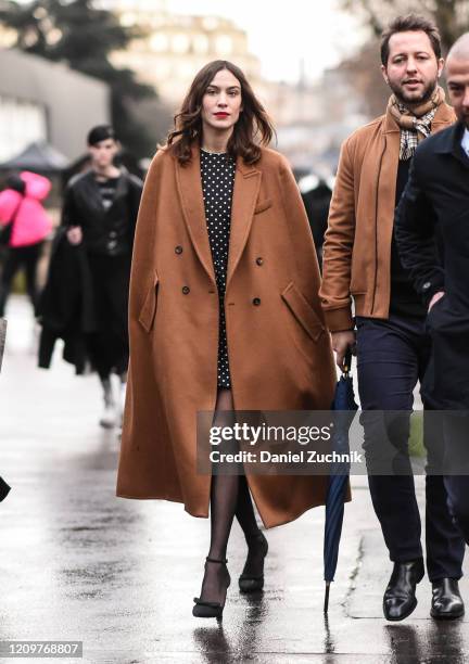 Alexa Chung and Derek Blasberg are seen outside the Valentino show during Paris Fashion Week: AW20 on March 01, 2020 in Paris, France.