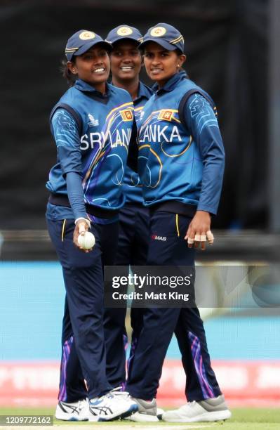 Shashikala Siriwardena of Sri Lanka celebrates with team mates after taking the wicket of Fahima Khatun of Bangladesh during the ICC Women's T20...