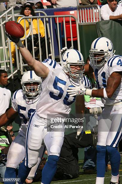 Indianapolis Colts LB Rocky Boiman intercepts Chad Pennington in the end zone during action in the Jets' 31-28 loss to the Indianapolis Colts at the...