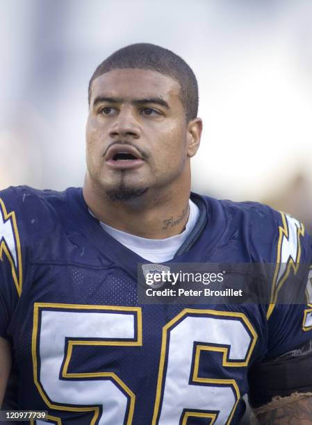 Shawne Merriman linebacker for the San Diego Chargers checks the score board while his offense is on the field in a game against the Arizona Cardinal...