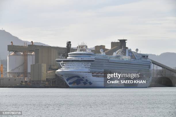 Cruise liner Ruby Princess docks at the harbour in Port Kembla, some 80 kilometres south of Sydney on April 12, 2020. The Ruby Princess berthed after...