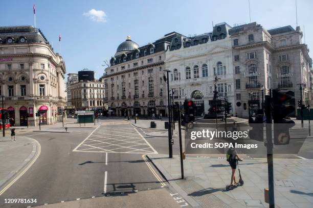 Normally crowded Piccadilly Circus seen deserted during lockdown due to corona virus pandemic. Boris Johnson, announced strict lockdown measures...