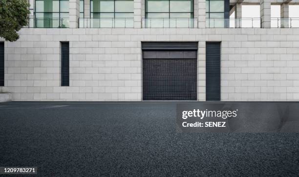 empty square by modern architectures - parking entrance stock-fotos und bilder