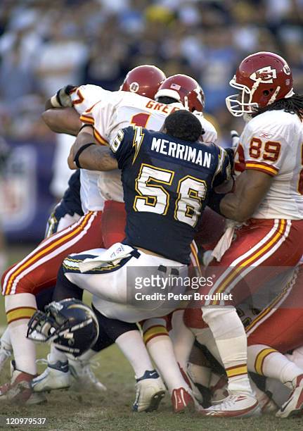 Shawne Merriman rookie linebacker for the San Diego Chargers loses his helmet while sacking Trent Green in a game against the Kansas City Chiefs at...