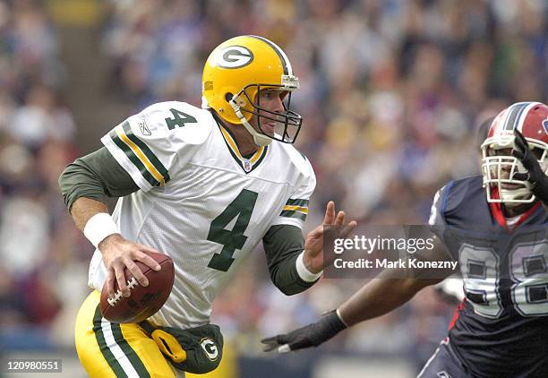 Brett Favre of the Green Bay Packers against Ryan Neufeld of the Buffalo Bills during a game between the Green Bay Packers and Buffalo Bills at Ralph...