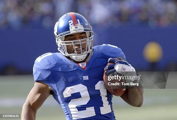 New York Giants running back Tiki Barber scoring his first touchdown of the 2006 season during the Houston Texans vs New York Giants game on November...