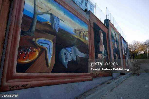 Mural features The Persistence of Memory by Salvador Dali created by the artists of the í97 Project on the wall of the descent between Frantsuzkyi...