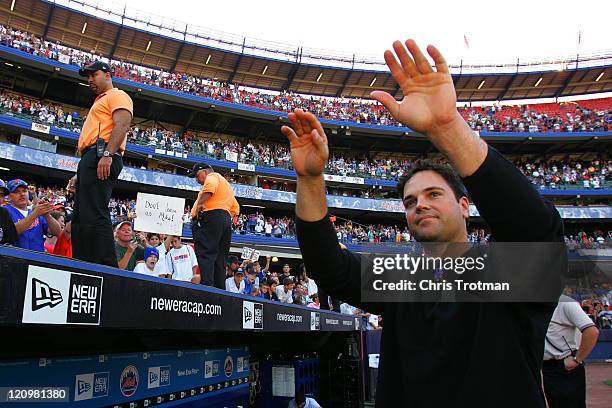 Mike Piazza catcher of the New York Mets acknowledges the fans, following possibly his final game as a New York Met at Shea Stadium on October 2,...