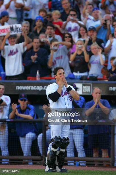 Mike Piazza catcher of the New York Mets blows a kiss to the fans, during the 7th inning in possibly his last game as a New York Met at Shea Stadium...