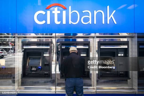 Customer uses an automated teller machine at a Citigroup Inc. Citibank branch in New York, U.S., on Friday, April 10, 2020. Citigroup is scheduled to...