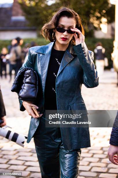 Bella Hadid, wearing a green leather suit, is seen outside Lanvin, during Paris Fashion Week - Womenswear Fall/Winter 2020/2021 : Day Three on...