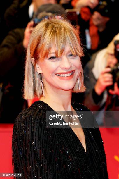 German actress Heike Makatsch arrive for the opening ceremony and "My Salinger Year" premiere during the 70th Berlinale International Film Festival...