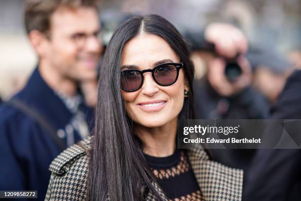 Demi Moore wears sunglasses, outside Dior, during Paris Fashion Week - Womenswear Fall/Winter 2020/2021, on February 25, 2020 in Paris, France.