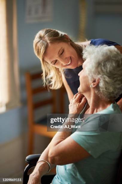 devoted care and assistance - family hospital old stock pictures, royalty-free photos & images