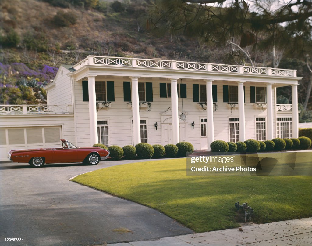 View of house with car