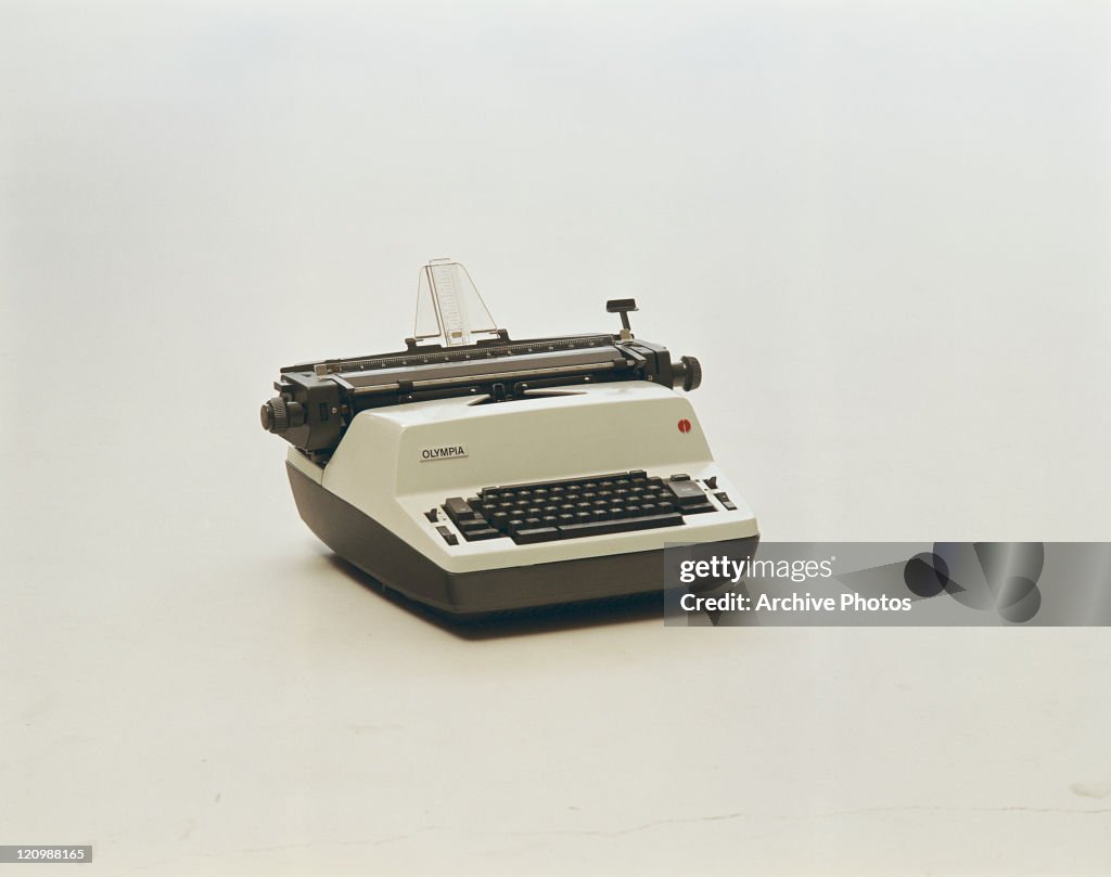 Old type writer on white background