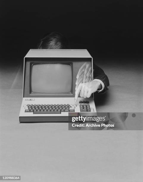 Hide Behind Computer Photos and Premium High Res Pictures - Getty Images