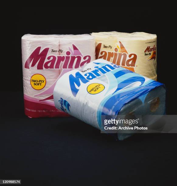 Plastic packaging of tissue paper on black background, close-up