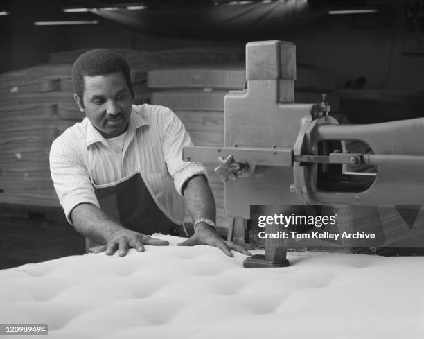 man manufacturing duvet in factory - 1983 stock pictures, royalty-free photos & images