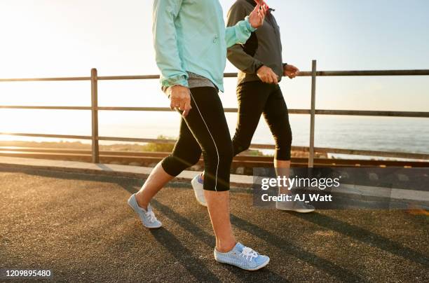 walking keeps you healthy - walking imagens e fotografias de stock