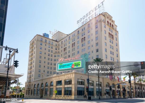 View of the The Hollywood Roosevelt hotel on Hollywood Blvd and its marquee displaying public health messages on April 14, 2020 in Los Angeles,...