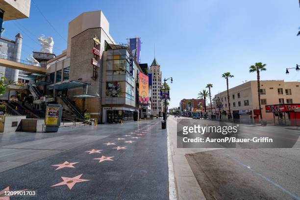 View of an empty Hollywood Blvd at noon on April 14, 2020 in Los Angeles, California. California's 'Safer at Home' emergency order has been extended...